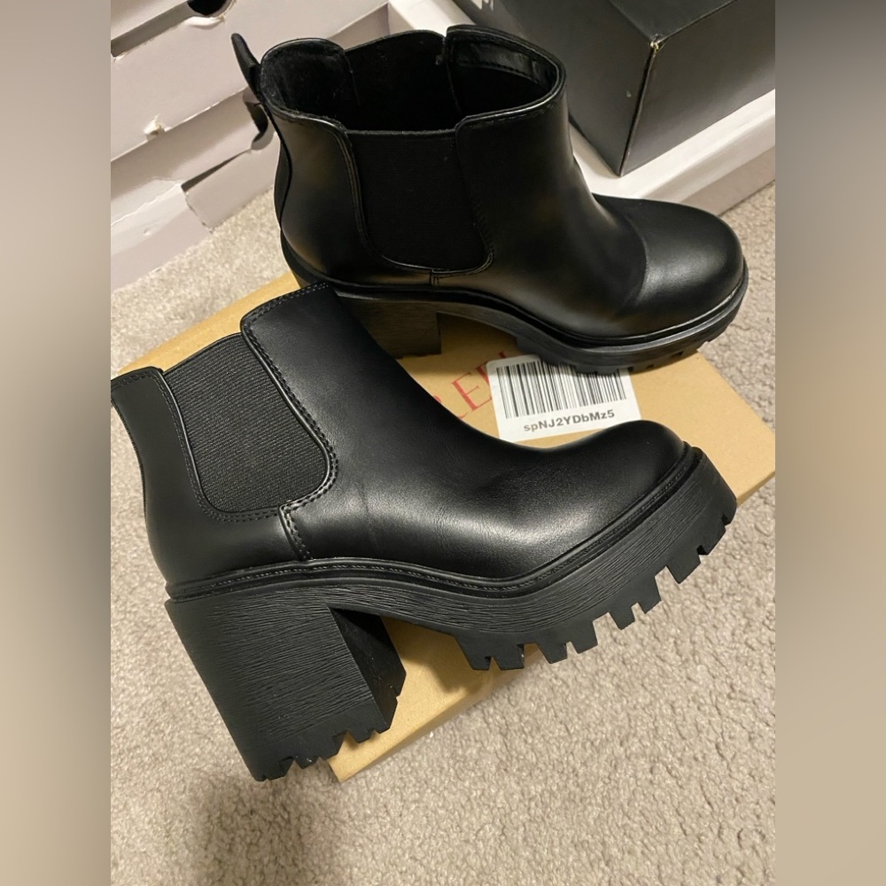 Sleek Black Platform Heeled Boots
